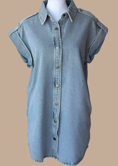 Denim dress with shirt tail side pockets and snap front