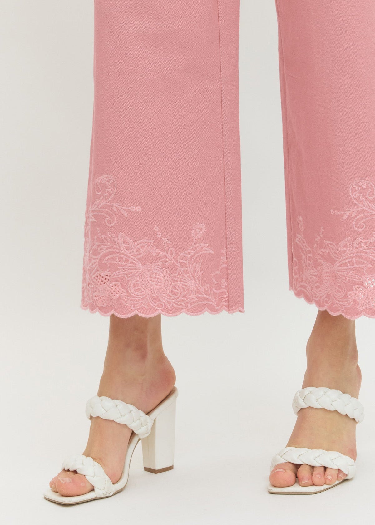 Pants with scalloped hem