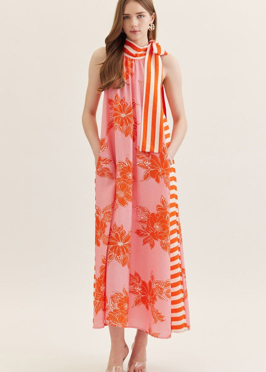 women wearing print sleeveless mid dress