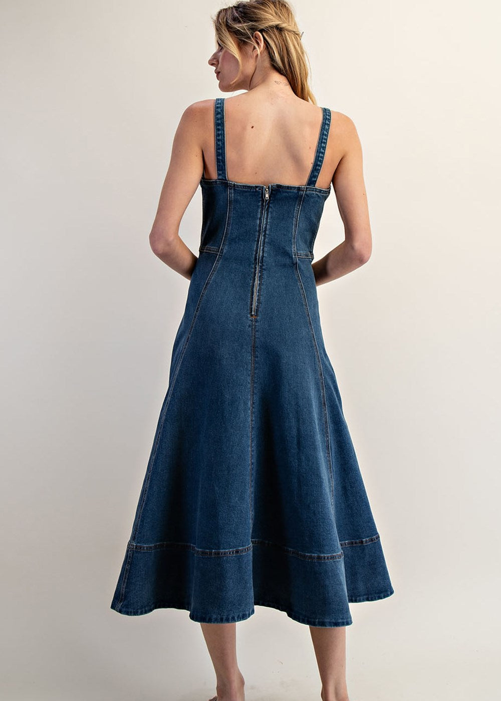 women wearing denim dress back side of this aline dress with zipper back