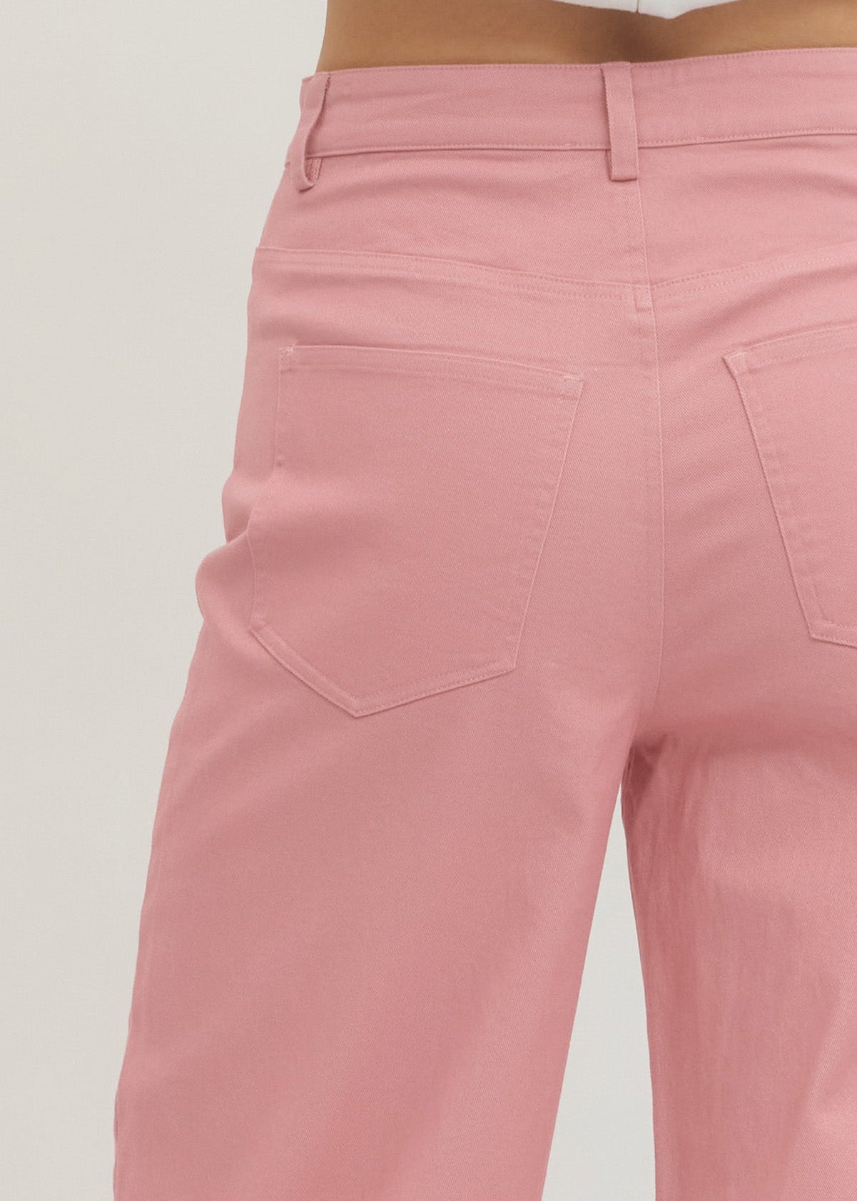 view of back pocket of pink pants