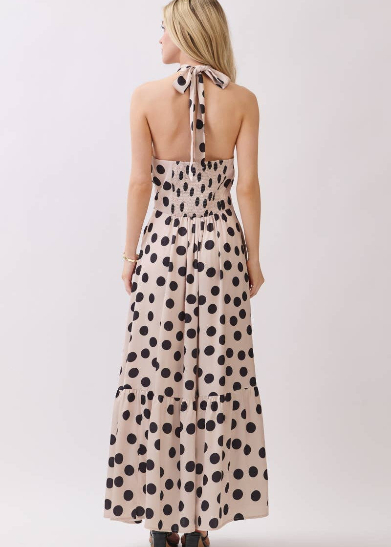 back of women wearing halter back tie dress