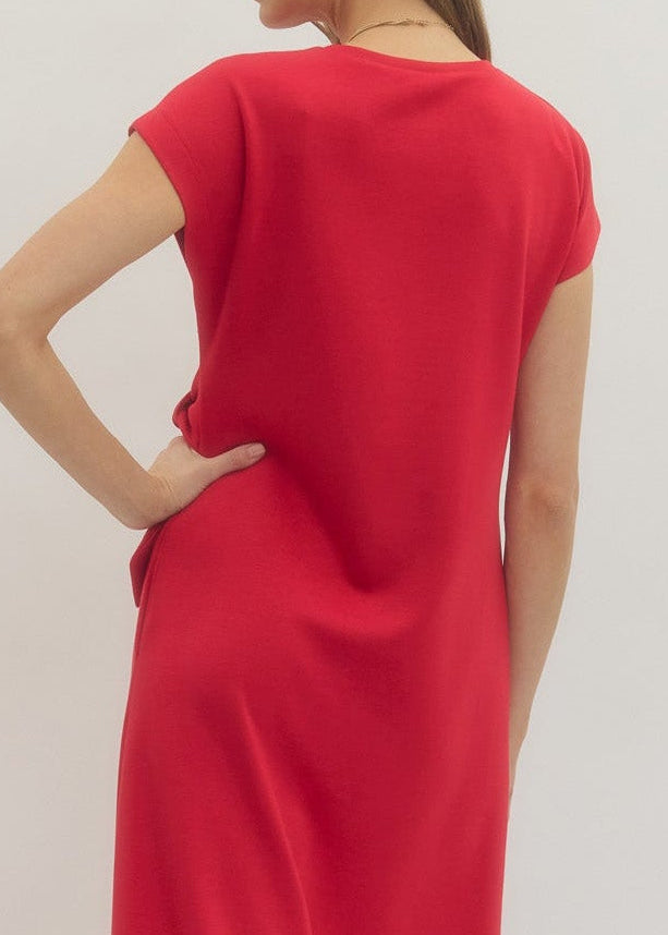 the back of the red tie dress