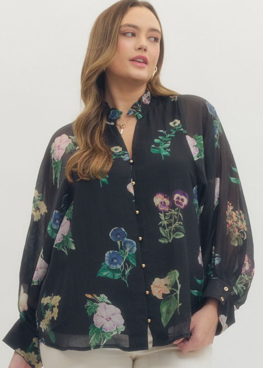 women wearing black tencel nylon blend blouse with floral print and buttoned up