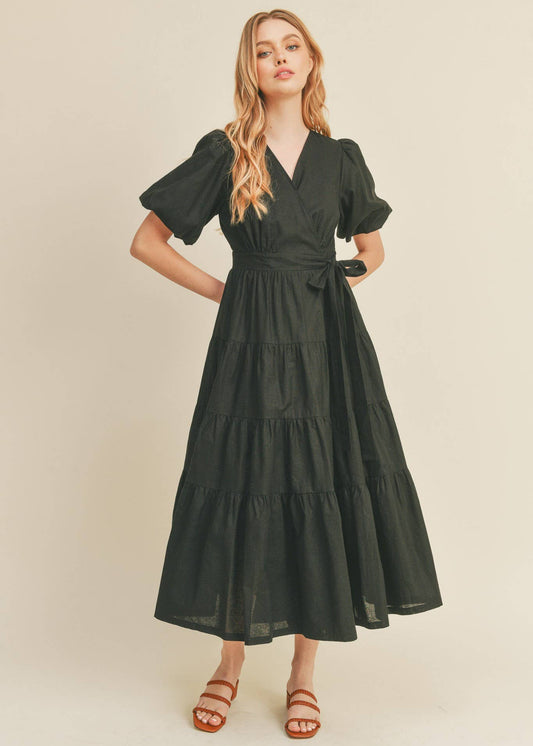 front view of women wearing midi wrap black dress 