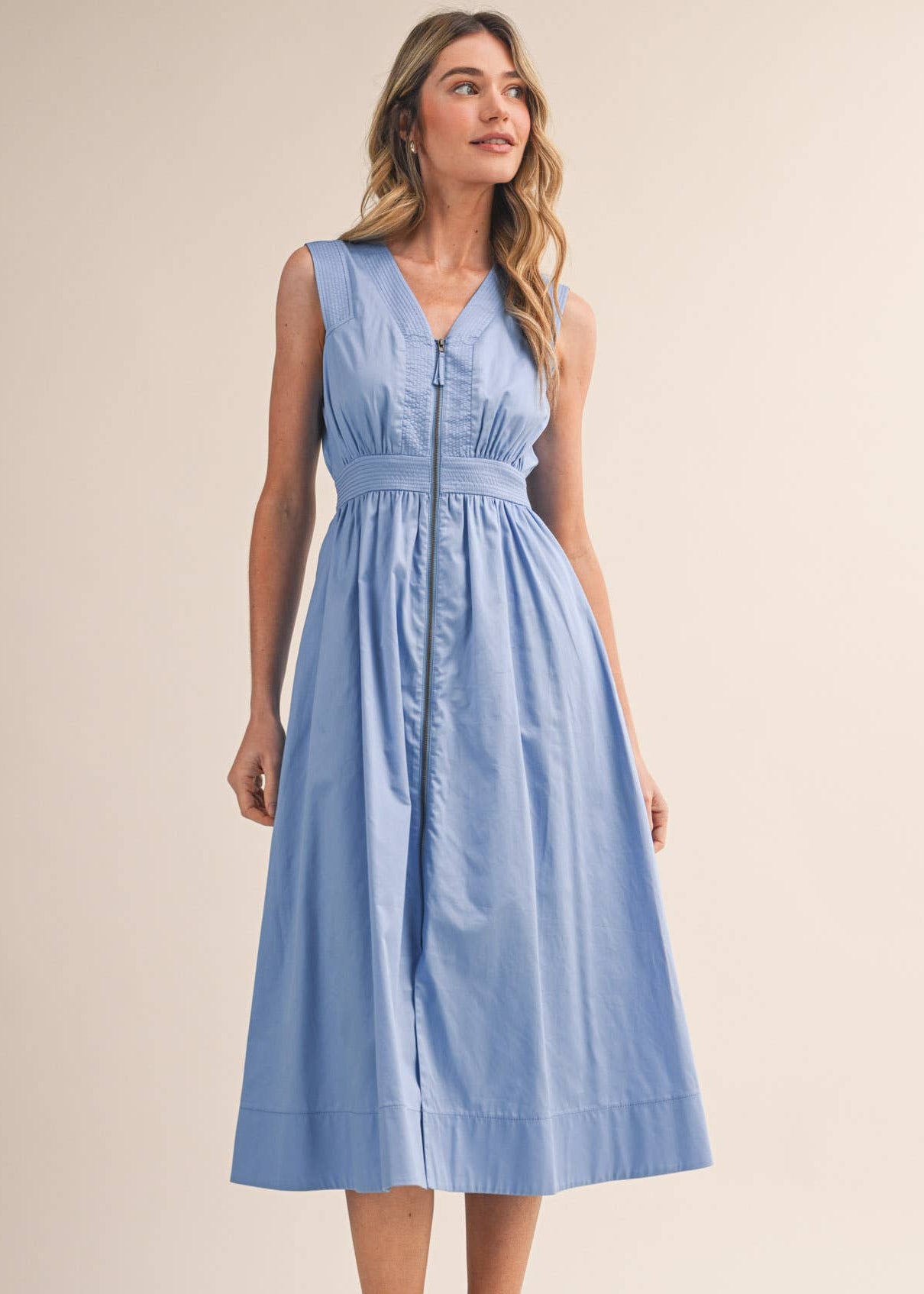 women wearing baby blue v neck sleeveless midi dress 