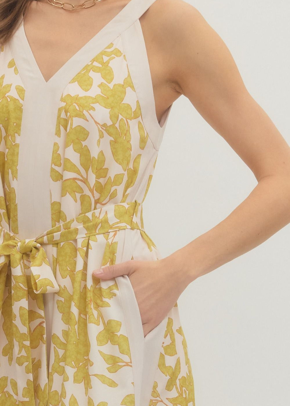 close up of front of women wearing floral dress