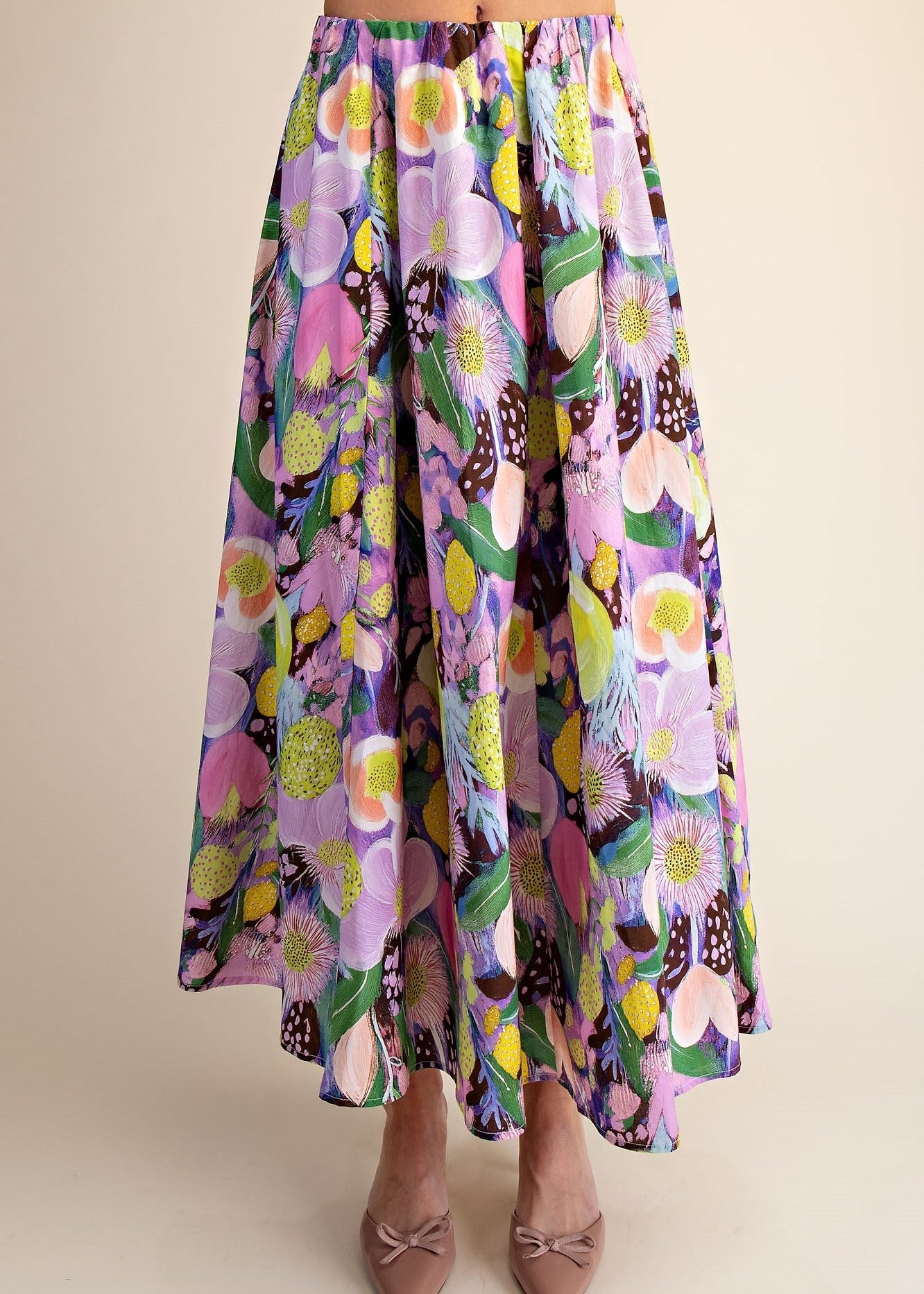 women wearing floral print midi skirt