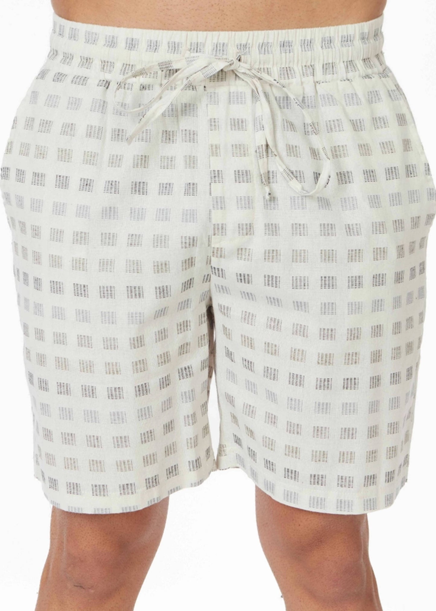 close up of mans white textured shorts