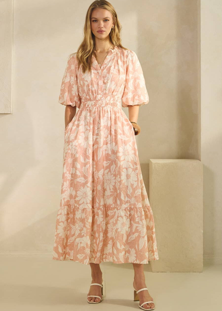 women wearing printed midi dress with strappy sandals 