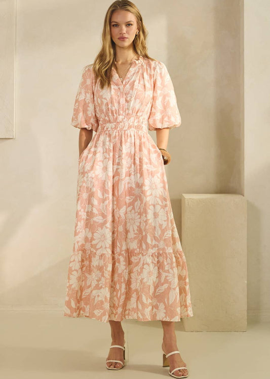 women wearing printed midi dress with strappy sandals 