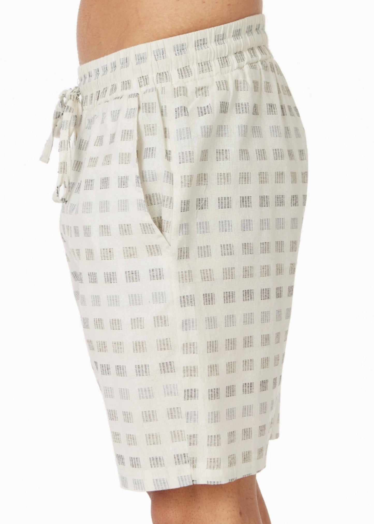 side view of mens textured shorts with pockets and drawstring waist 