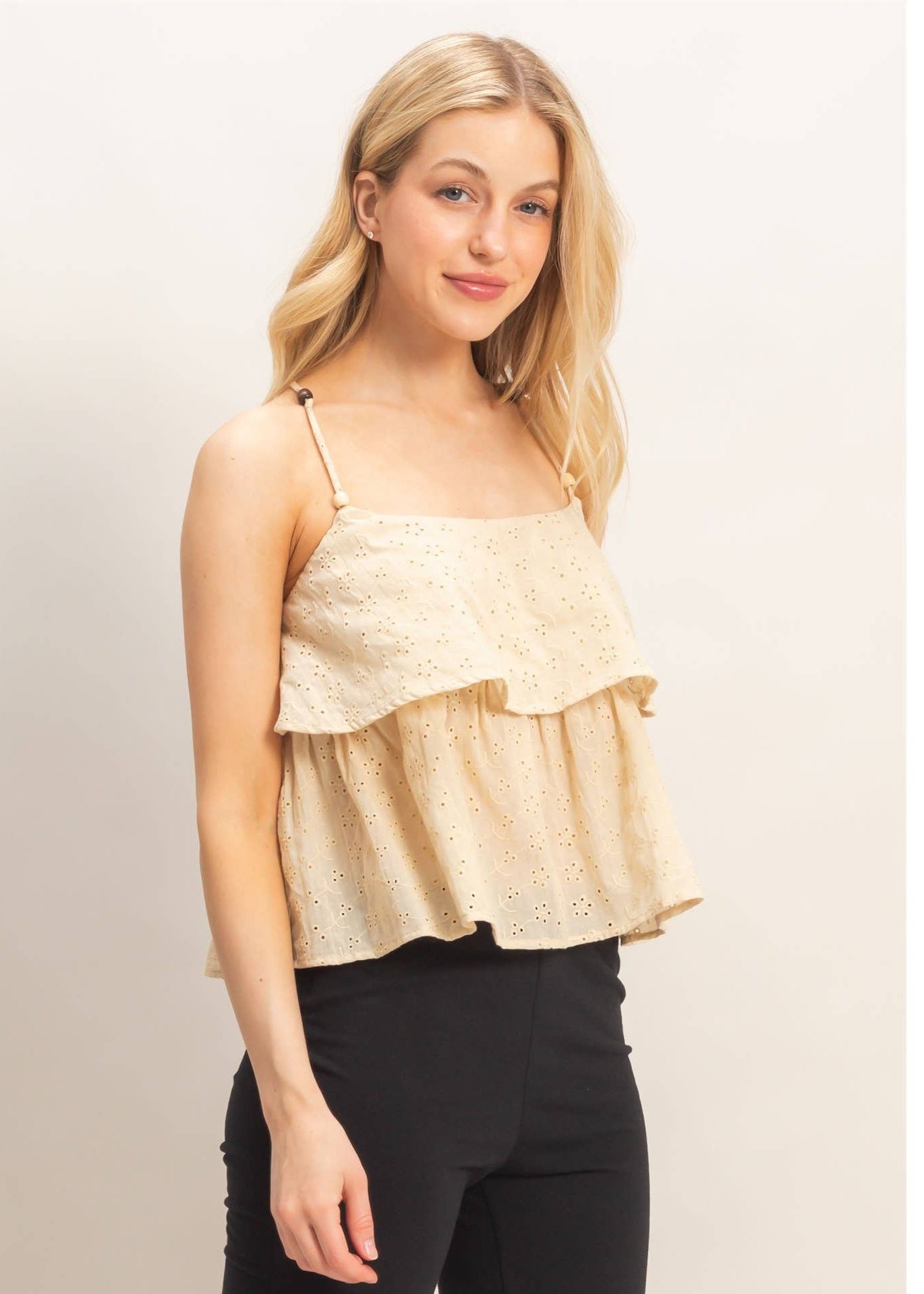 women wearing eyelet ivory spaghetti strap blouse