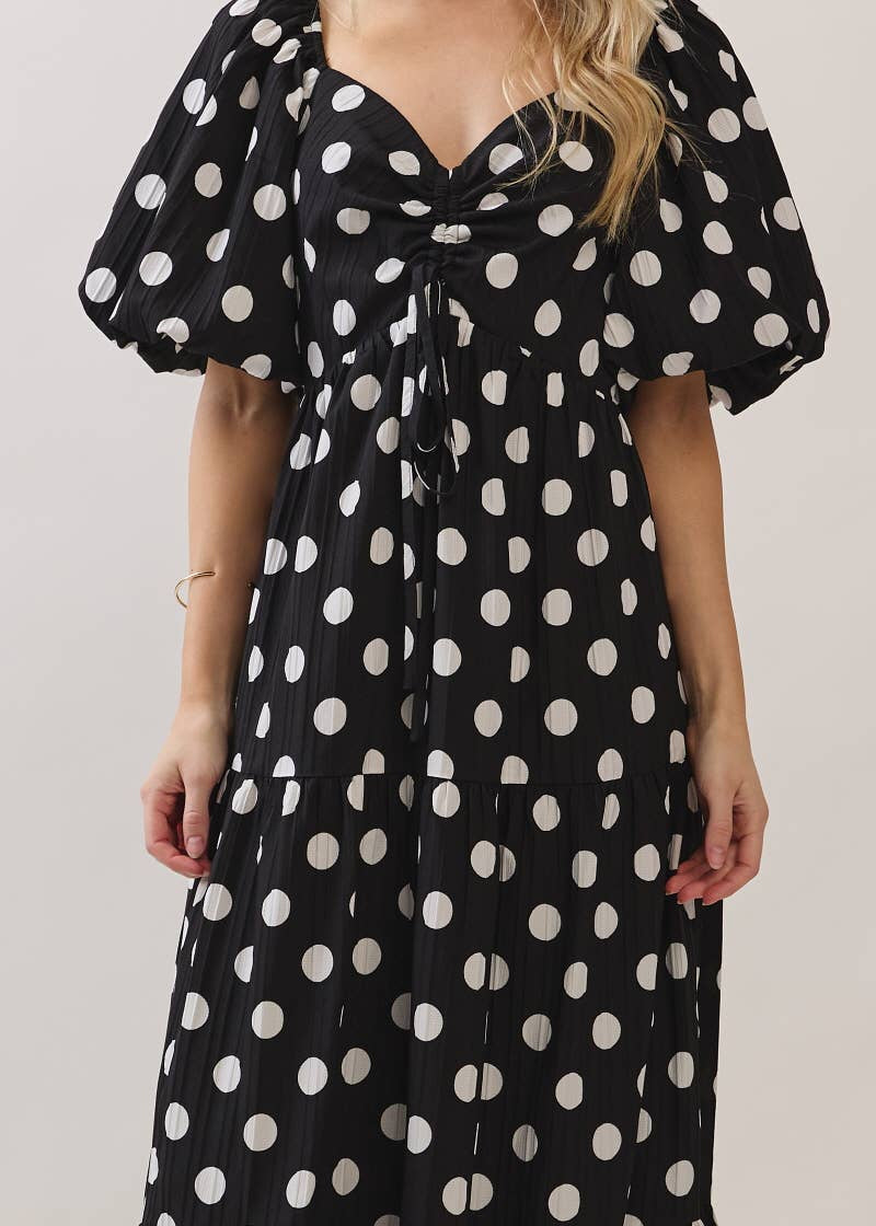 women close up of polka dot dress