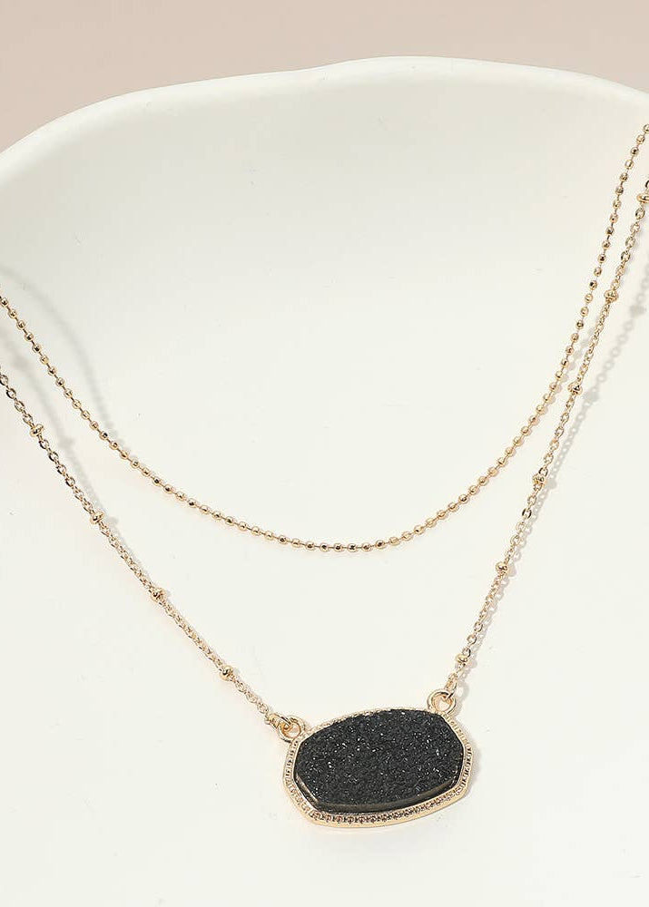 picture of layered necklace with black drizzy pendant 
